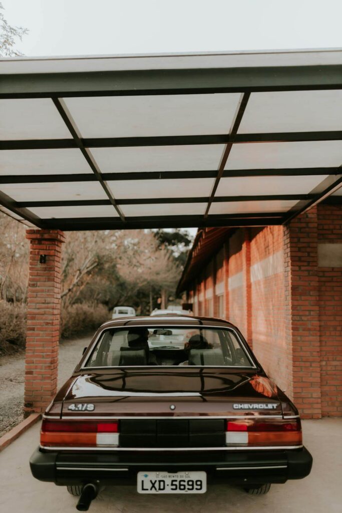 car parked under shelter for protection