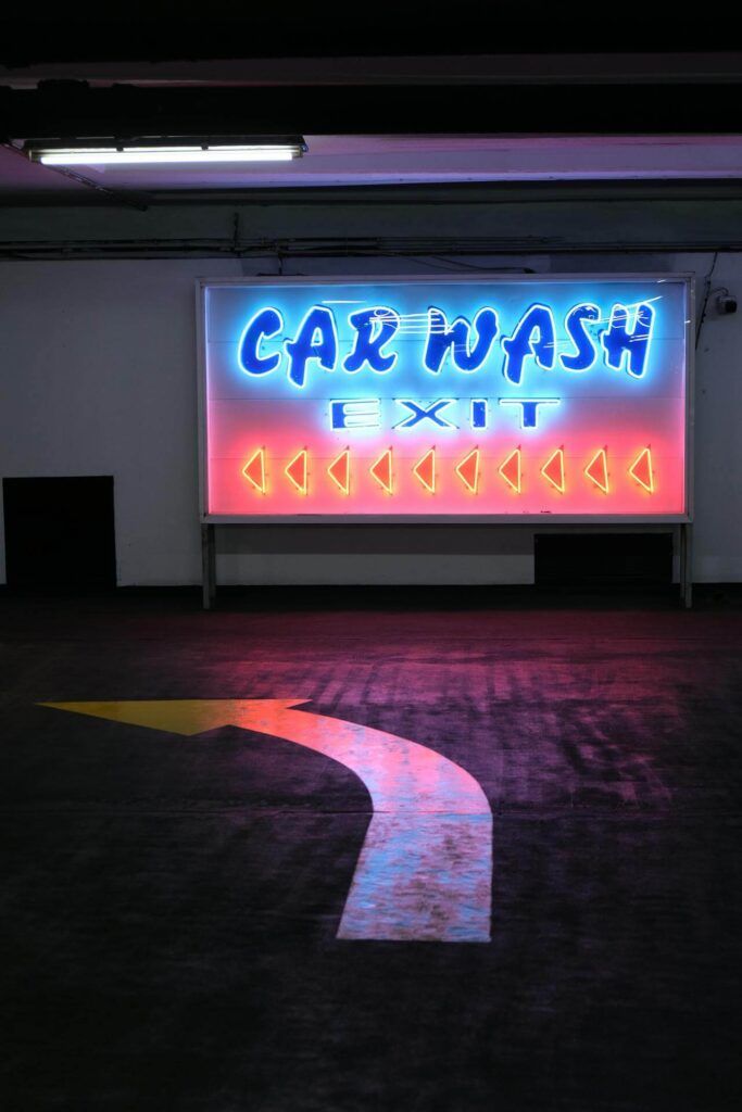 neon sign for carwash that used reclaimed water and harsh chemicals