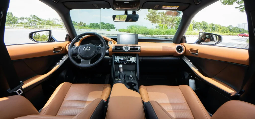 Luxury sports car interior with leather seats and metal gear