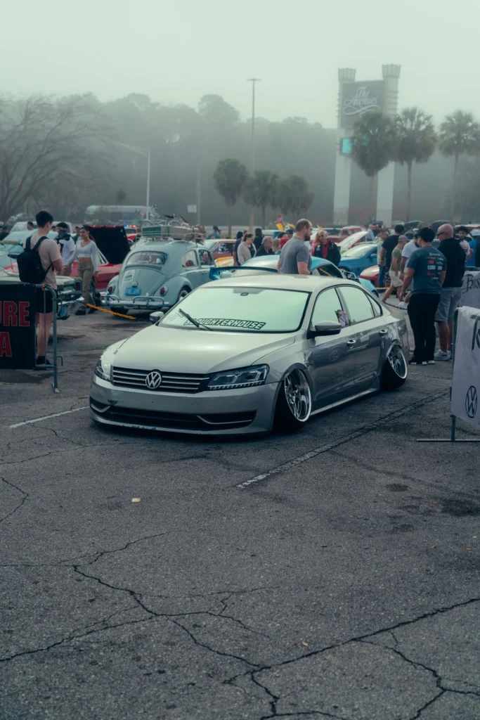 Car enthusiasts mingle at a Raleigh auto expo